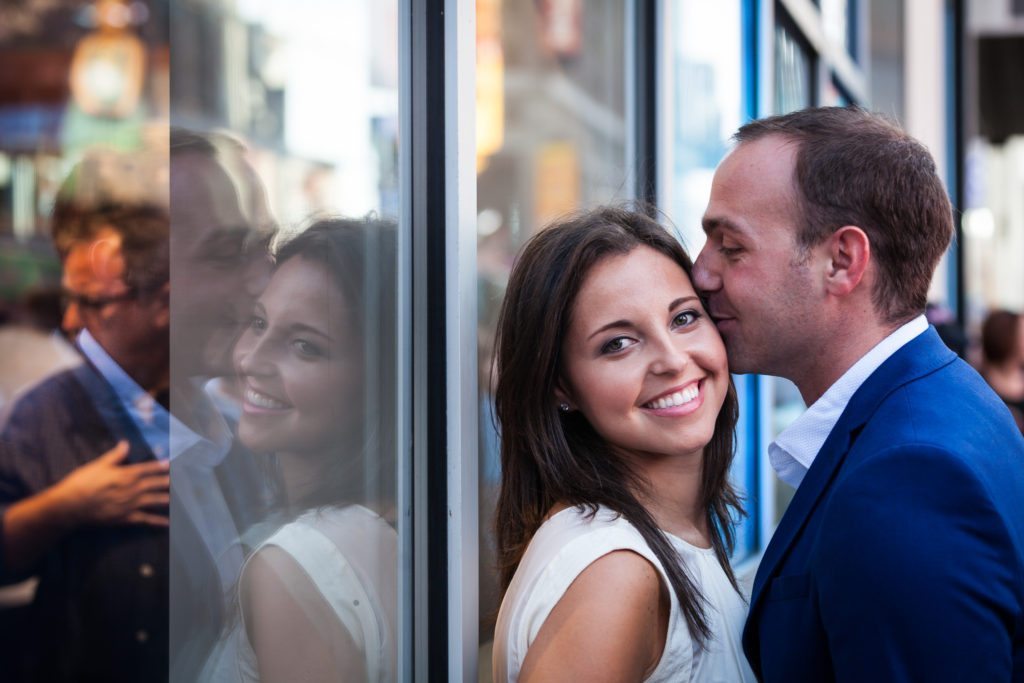 You're engaged, now what? Photo from an engagement shoot to accompany an article about what do you do after you get engaged, by Times Square engagement photographer, Kelly Williams