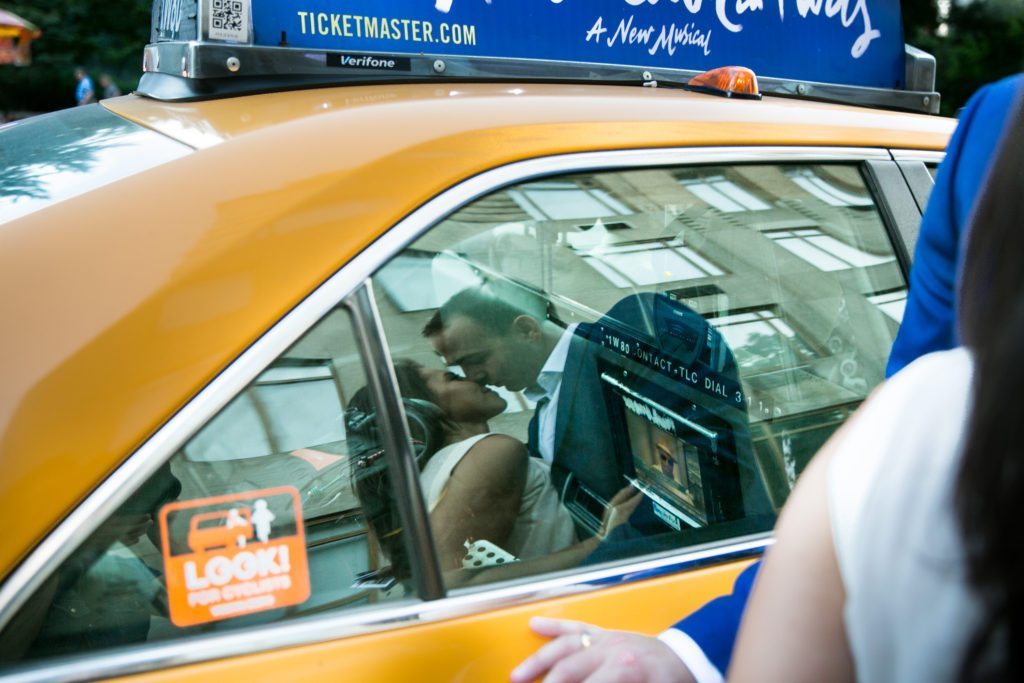 Photo from an engagement shoot to accompany an article about what do you do after you get engaged, by Times Square engagement photographer, Kelly Williams