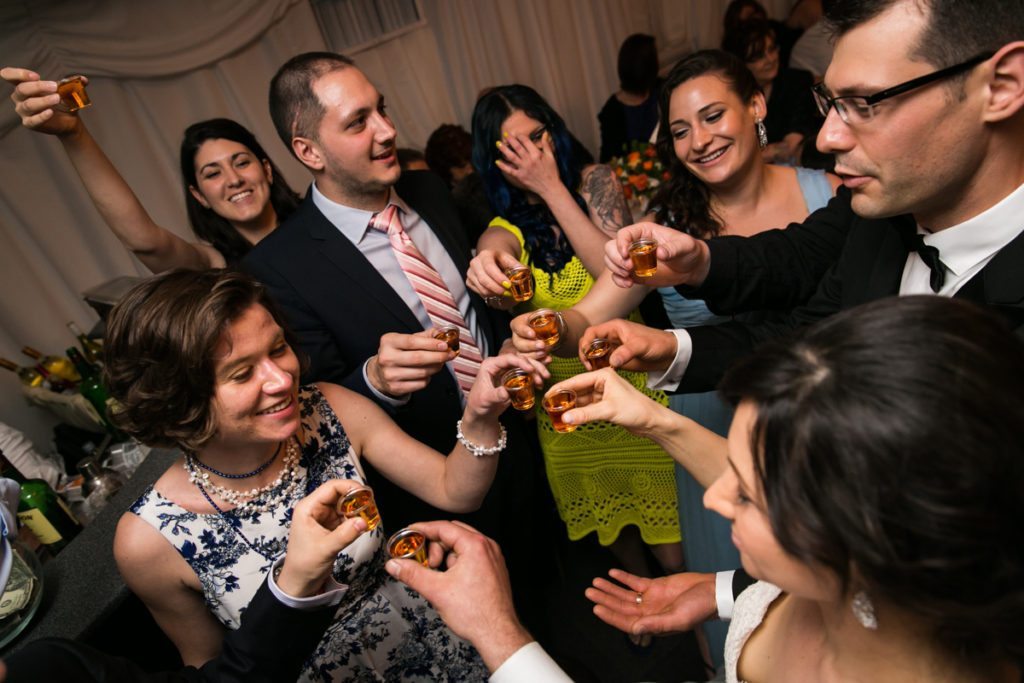 Guests toasting at a Pelham Bay & Split Rock Golf Club wedding reception