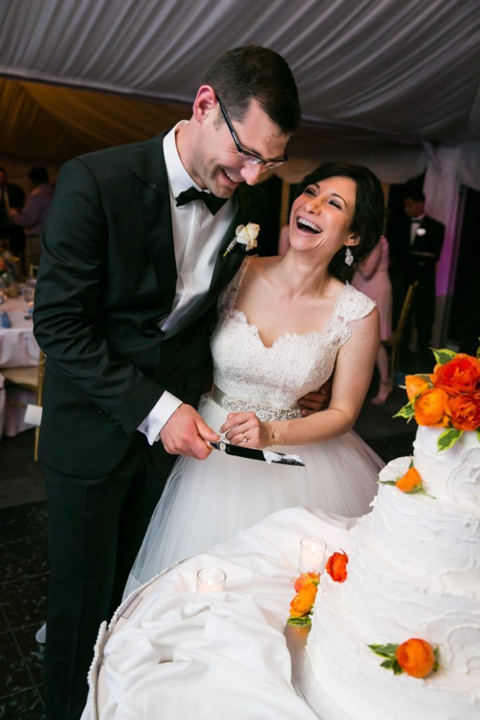 Cake cutting at a Pelham Bay & Split Rock Golf Club wedding reception