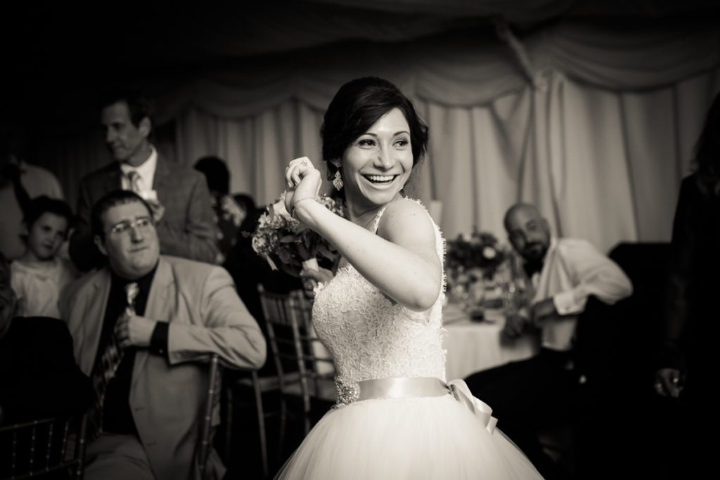 Bouquet toss at a Pelham Bay & Split Rock Golf Club wedding reception