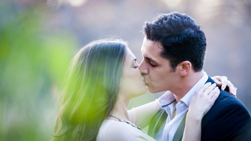 An engagement shoot photographed with a 70-200mm lens, by engagement photojournalist, Kelly Williams