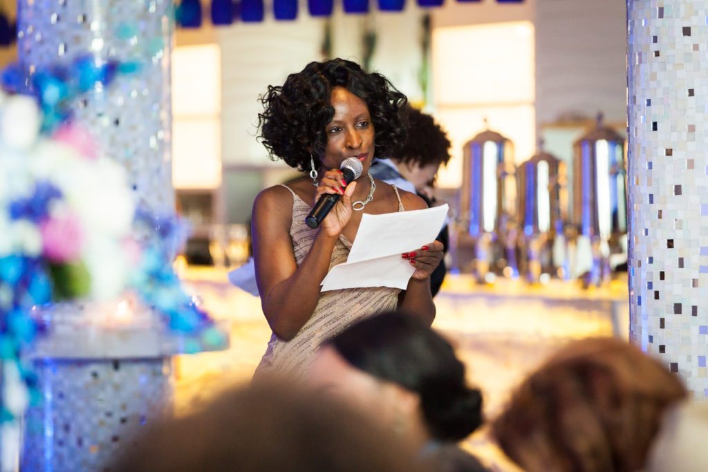 Toast at an Allegria Hotel party by NYC event photojournalist, Kelly Williams