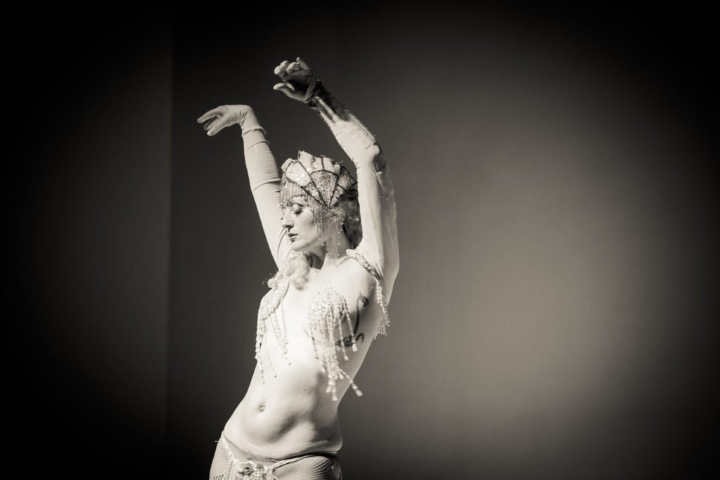 Ms. Tickle performing at the Atlas Obscura burlesque history lecture and cabaret performance