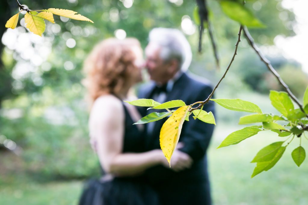 Couple posed for an article on Central Park engagement shoot tips by NYC engagement photographer, Kelly Williams