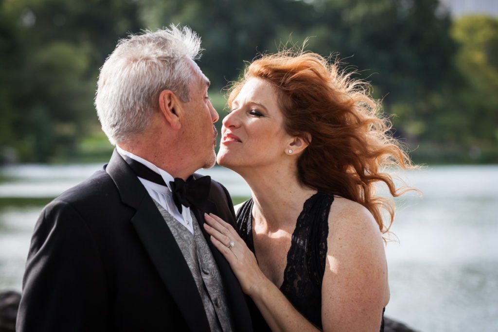 Couple posed for an article on Central Park engagement shoot tips by NYC engagement photographer, Kelly Williams