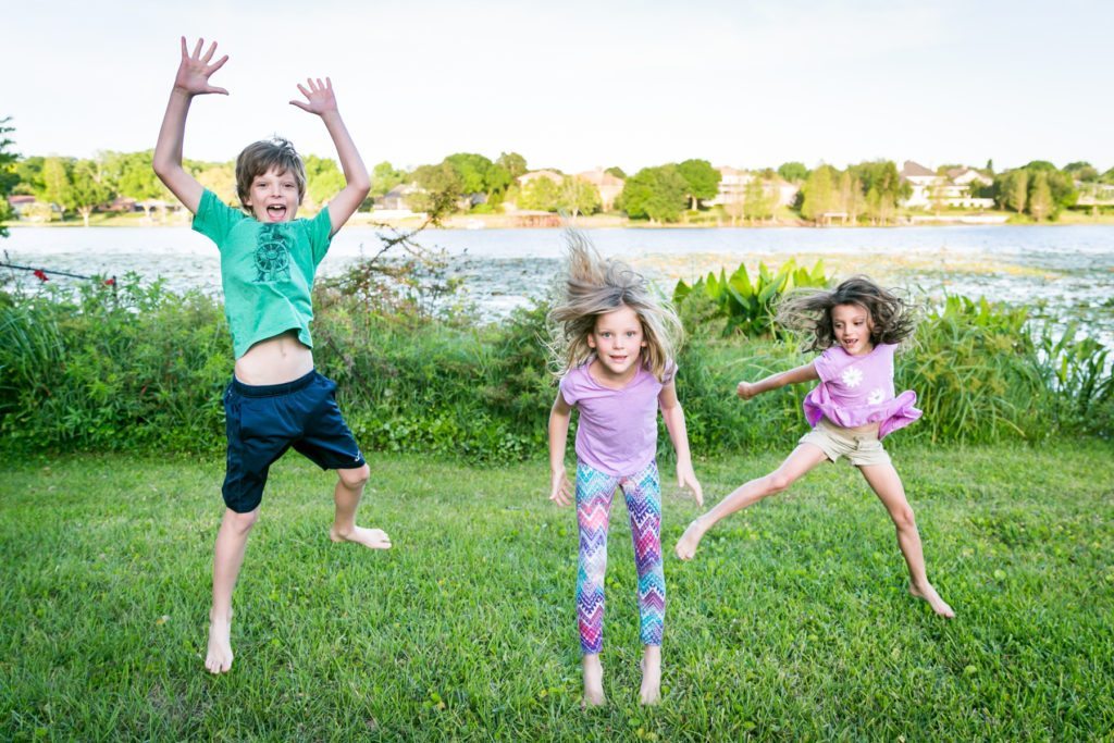 Fun family portraits in Florida by portrait photographer, Kelly Williams