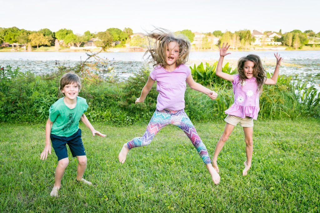 Fun family portraits in Florida by portrait photographer, Kelly Williams