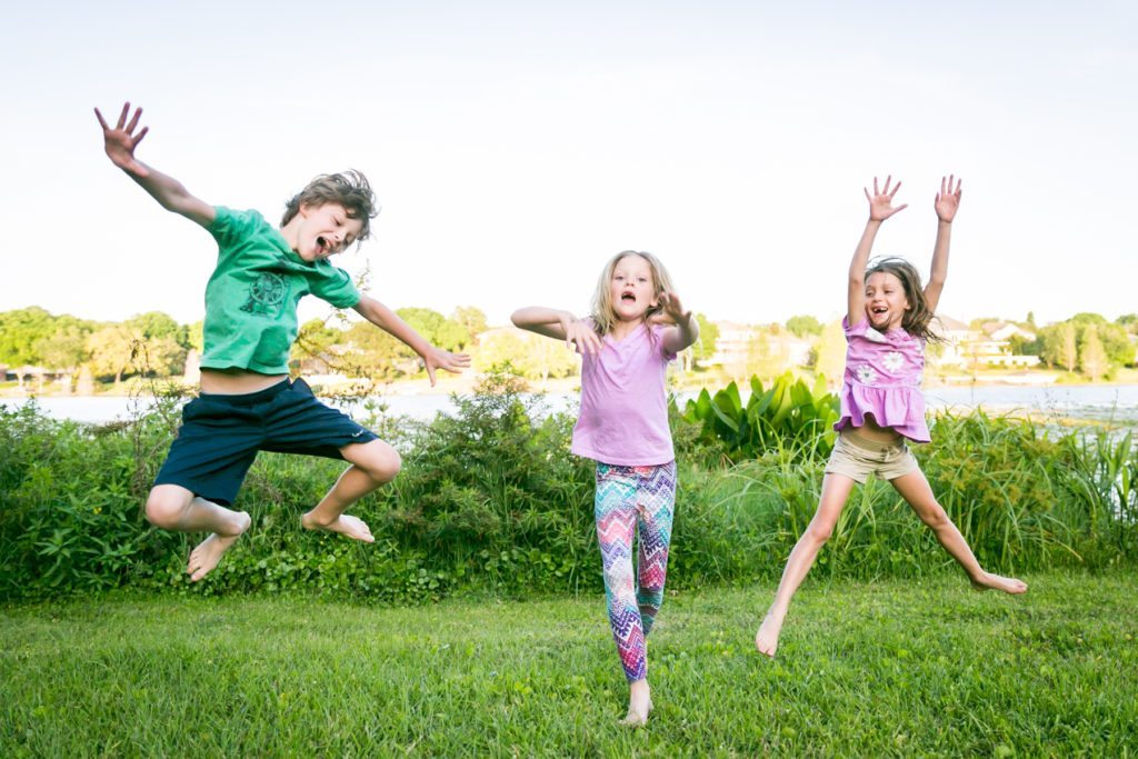 Fun family portraits in Florida by portrait photographer, Kelly Williams