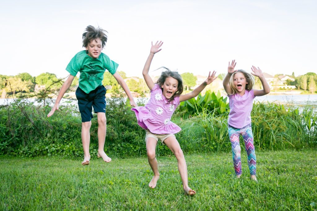 Fun family portraits in Florida by portrait photographer, Kelly Williams