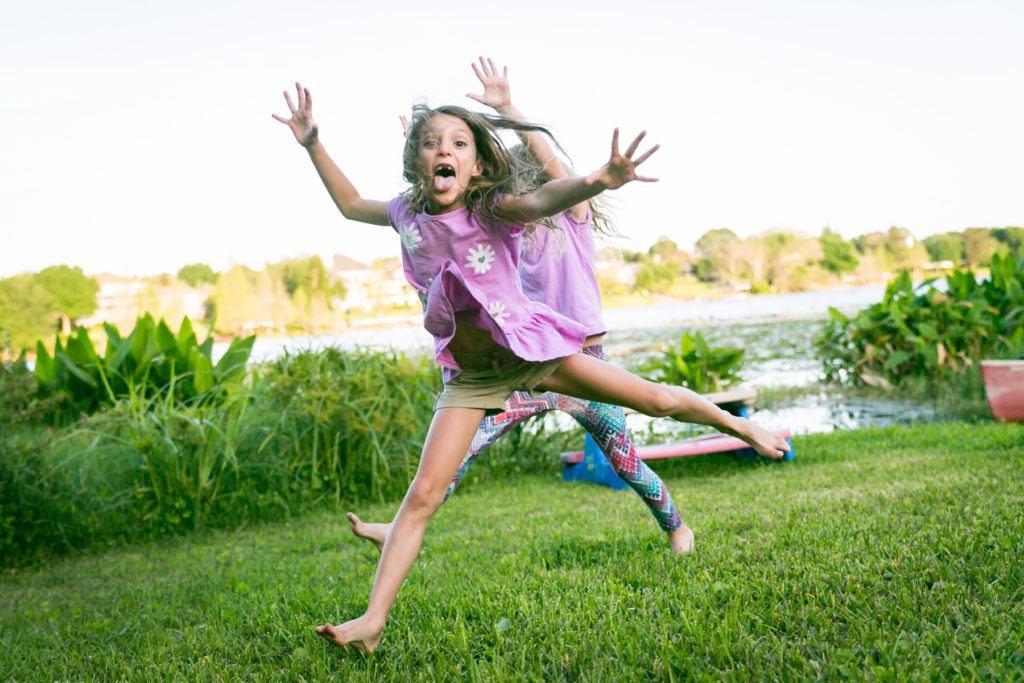 Fun family portraits in Florida by portrait photographer, Kelly Williams