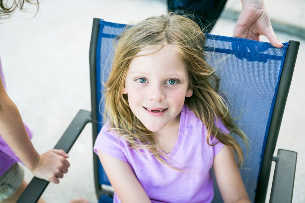 Fun family portraits in Florida by portrait photographer, Kelly Williams