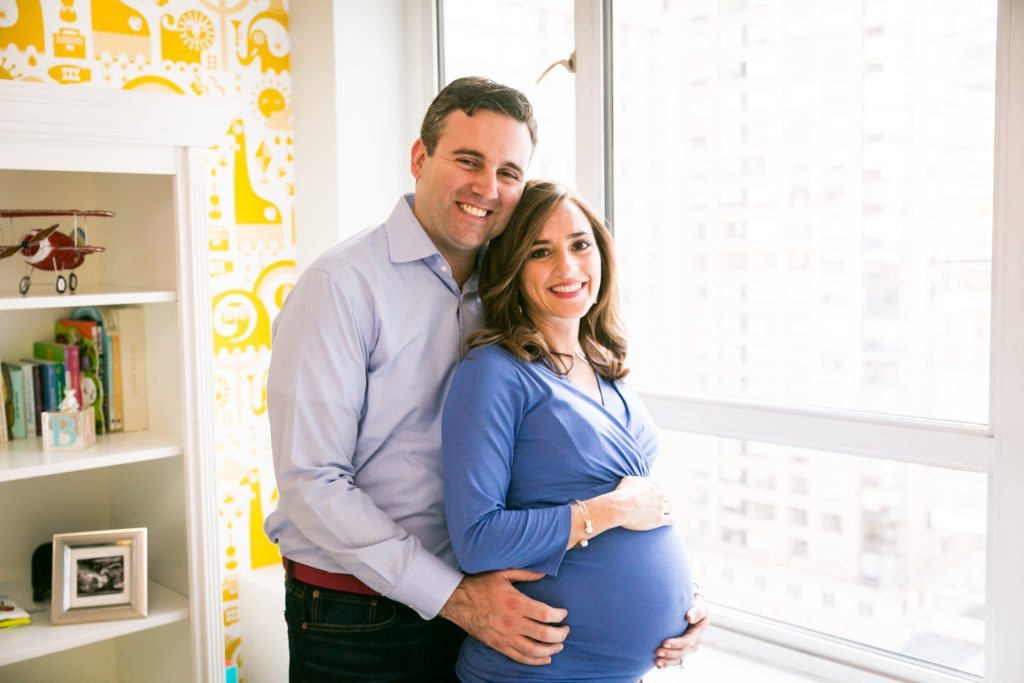 Manhattan parents-to-be by photojournalistic maternity photographer, Kelly Williams