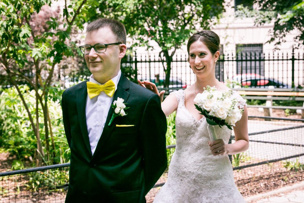 First look in Stuyvesant Square before a Columbus Citizens Foundation wedding by NYC wedding photojournalist, Kelly Williams