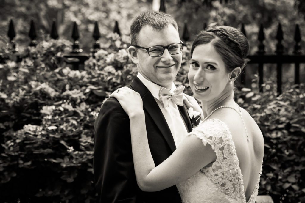 Bride and groom portrait in Stuyvesant Square before a Columbus Citizens Foundation wedding by NYC wedding photojournalist, Kelly Williams