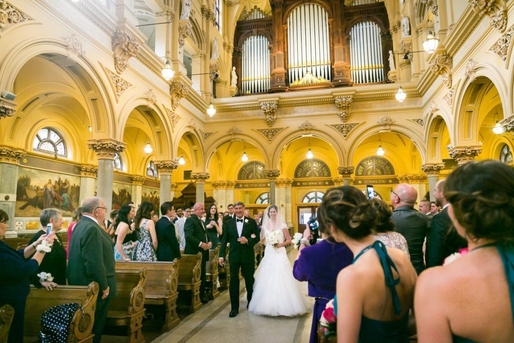 Ceremony at the Church of St. Francis Xavier before a Columbus Citizens Foundation wedding by NYC wedding photojournalist, Kelly Williams