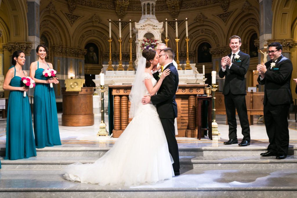 Ceremony at the Church of St. Francis Xavier before a Columbus Citizens Foundation wedding by NYC wedding photojournalist, Kelly Williams