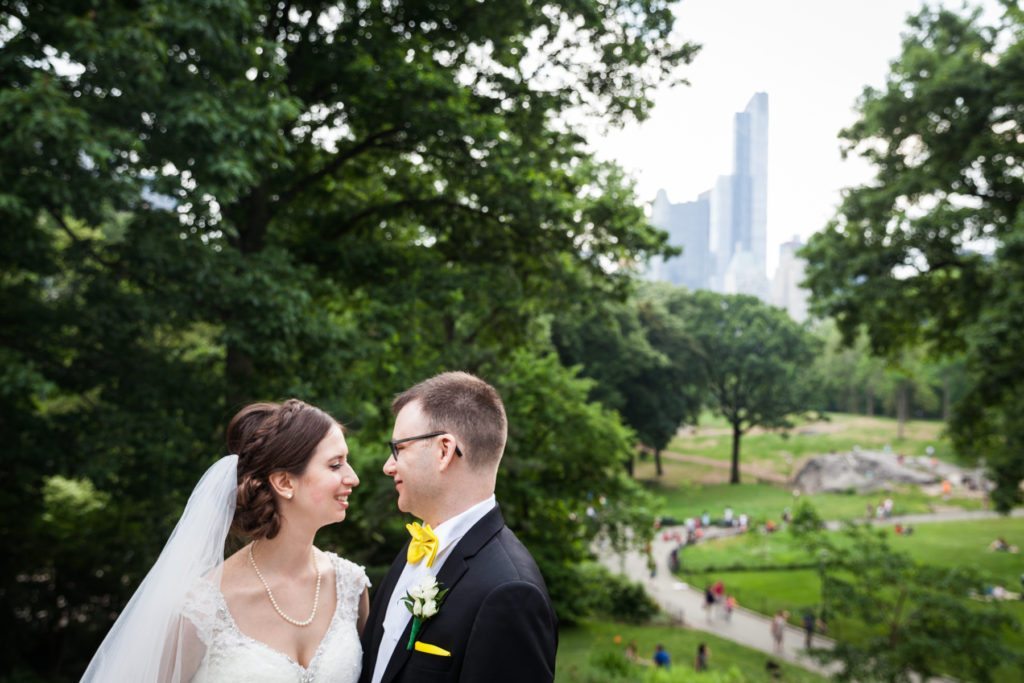 Bride and groom portrait in Central Park before a Columbus Citizens Foundation wedding by NYC wedding photojournalist, Kelly Williams