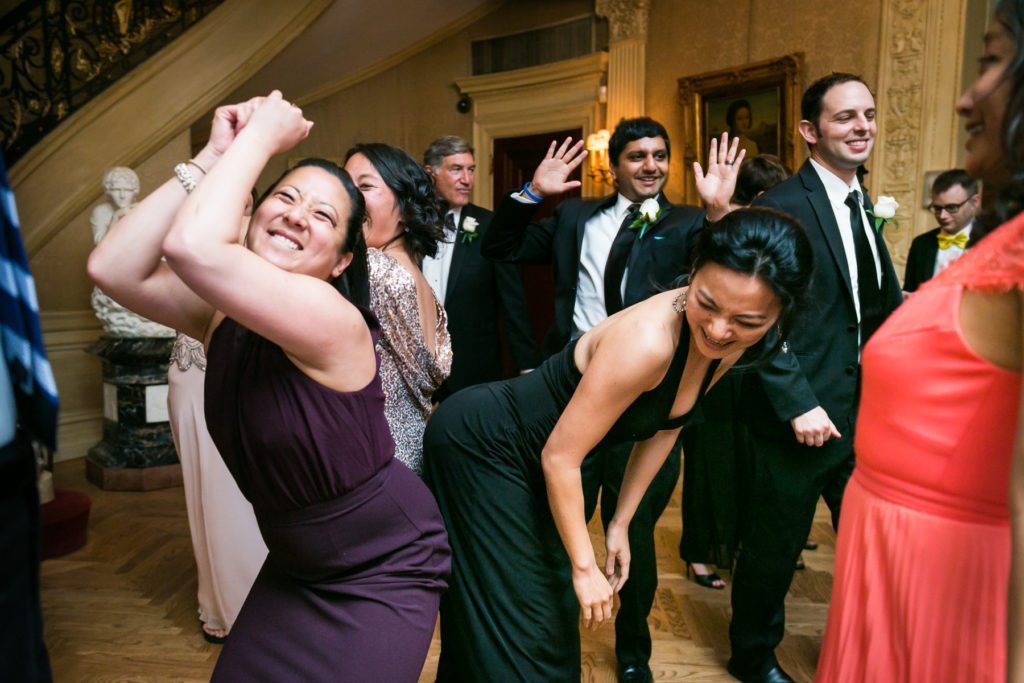 Guests dancing at a Columbus Citizens Foundation wedding by NYC wedding photojournalist, Kelly Williams