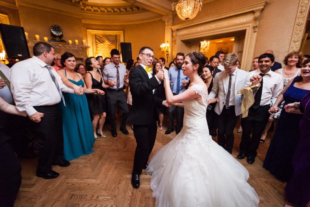 Tarantella dance at a Columbus Citizens Foundation wedding by NYC wedding photojournalist, Kelly Williams