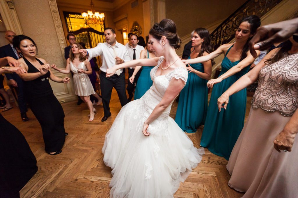 Guests dancing at a Columbus Citizens Foundation wedding by NYC wedding photojournalist, Kelly Williams