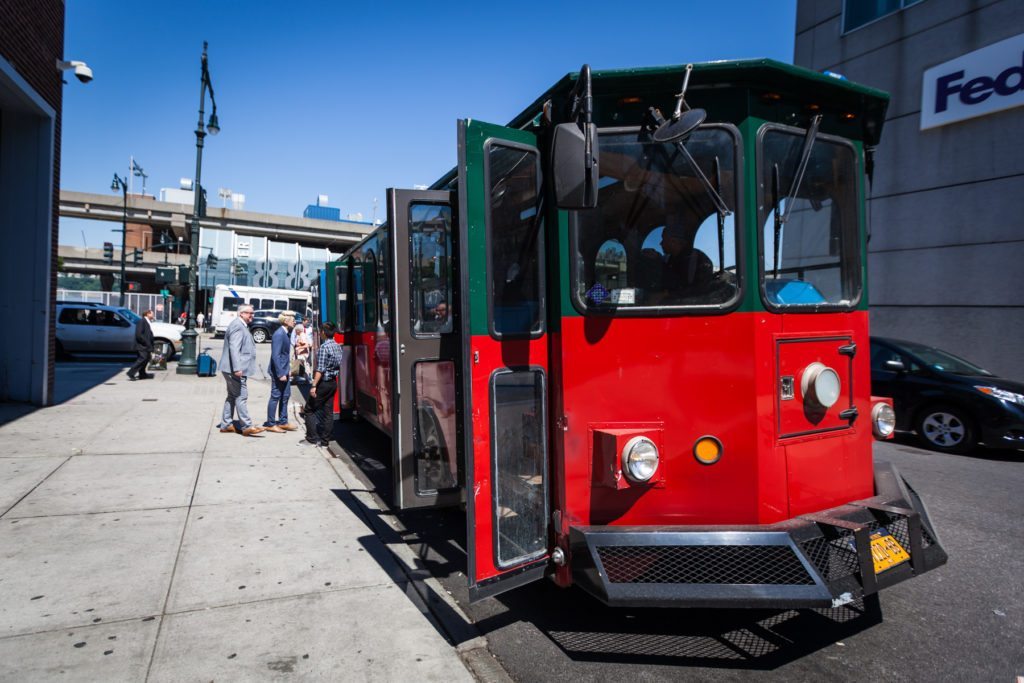 NY Trolley transport for a Ladies Pavilion wedding by NYC wedding photojournalist, Kelly Williams