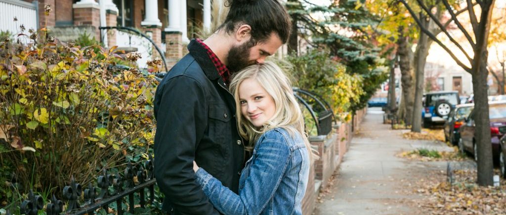 Windsor Terrace engagement photos of man kissing woman on the head