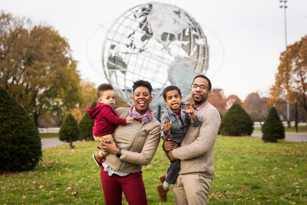 Flushing Meadows Corona Park family portrait in front of Unisphere