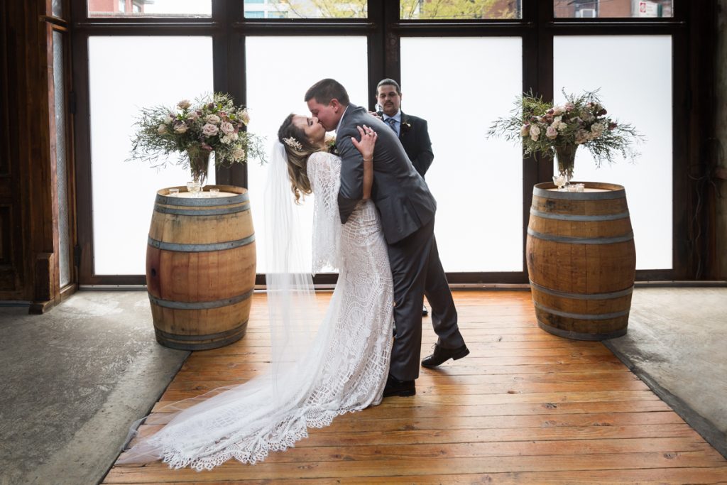 Brooklyn Winery wedding photos of bride and groom kissing after ceremony
