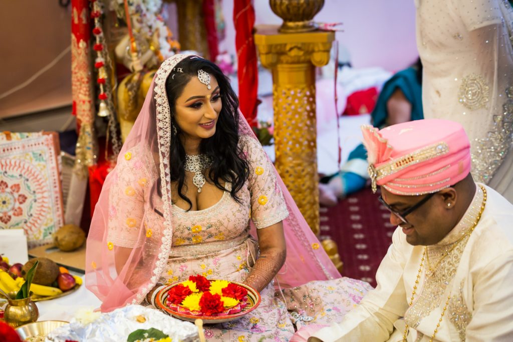 Bride looking at groom during sagai