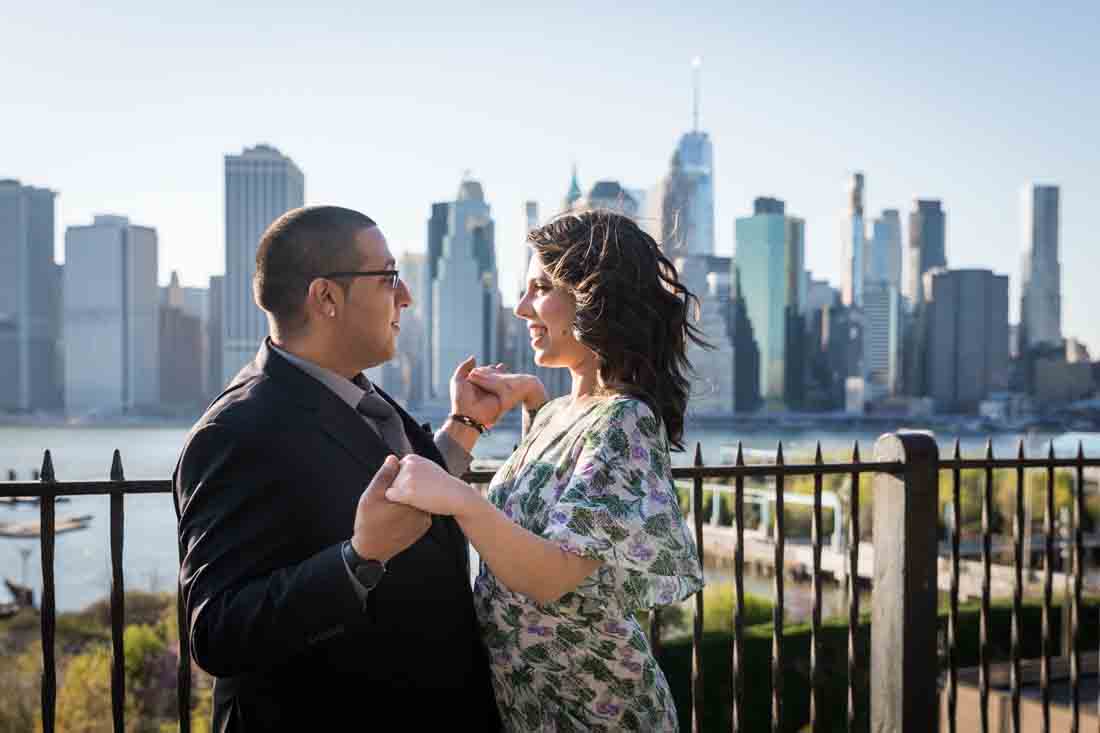 Couple dancing during a Brooklyn Heights Promenade engagement photo shoot