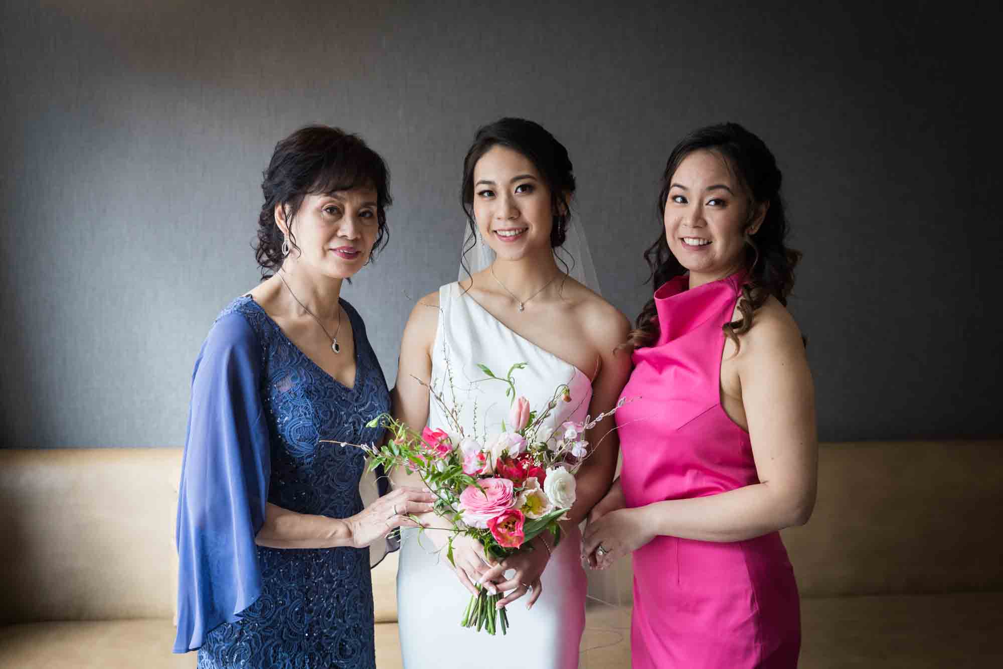 Portrait of bride with mother and sister
