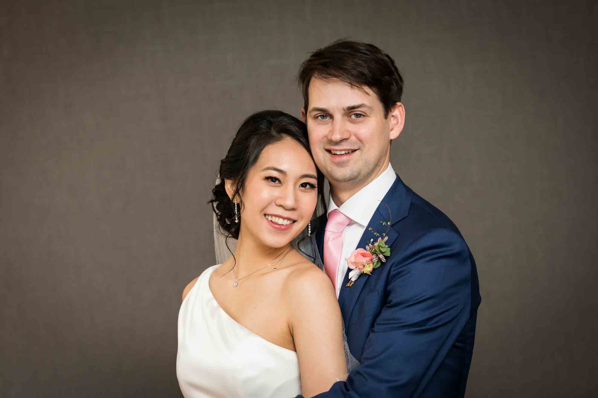 Bride and groom hugging