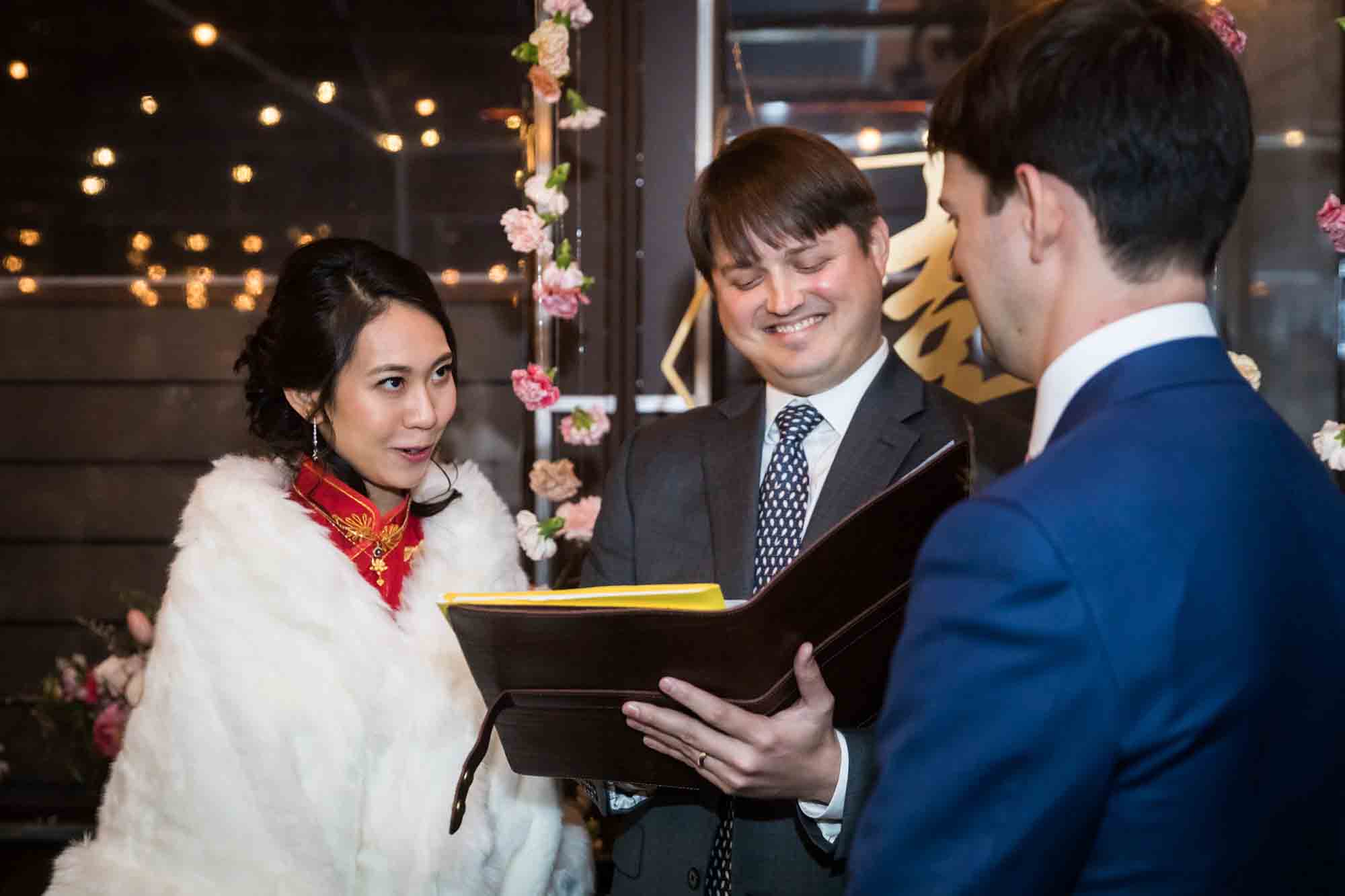 Bride and groom saying vows at a Brooklyn restaurant wedding