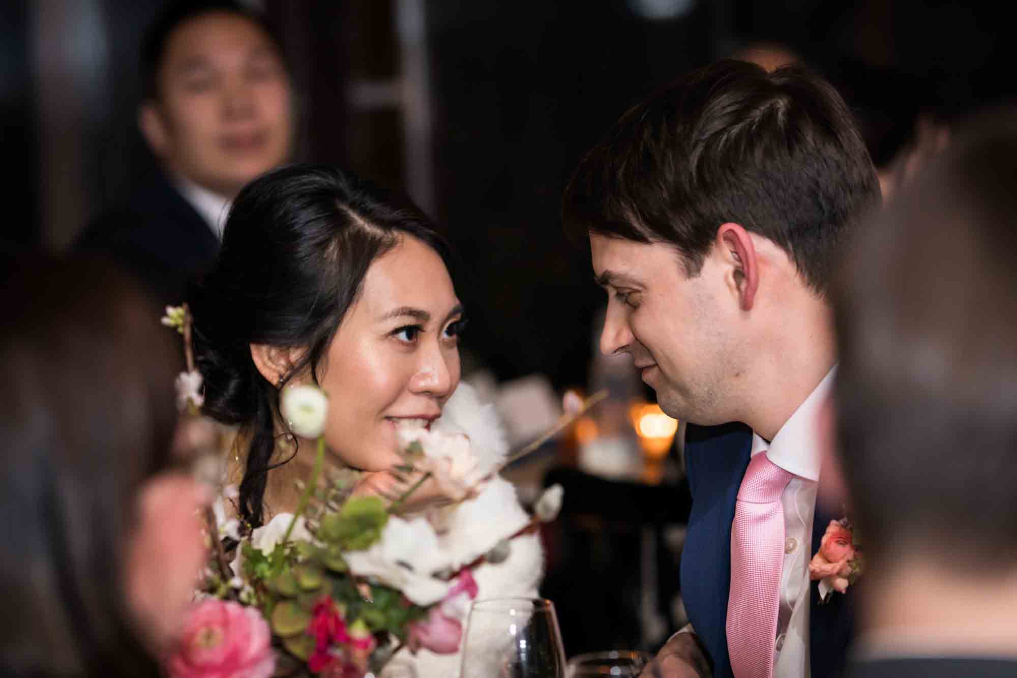 Bride and groom looking at each other at a Brooklyn restaurant wedding