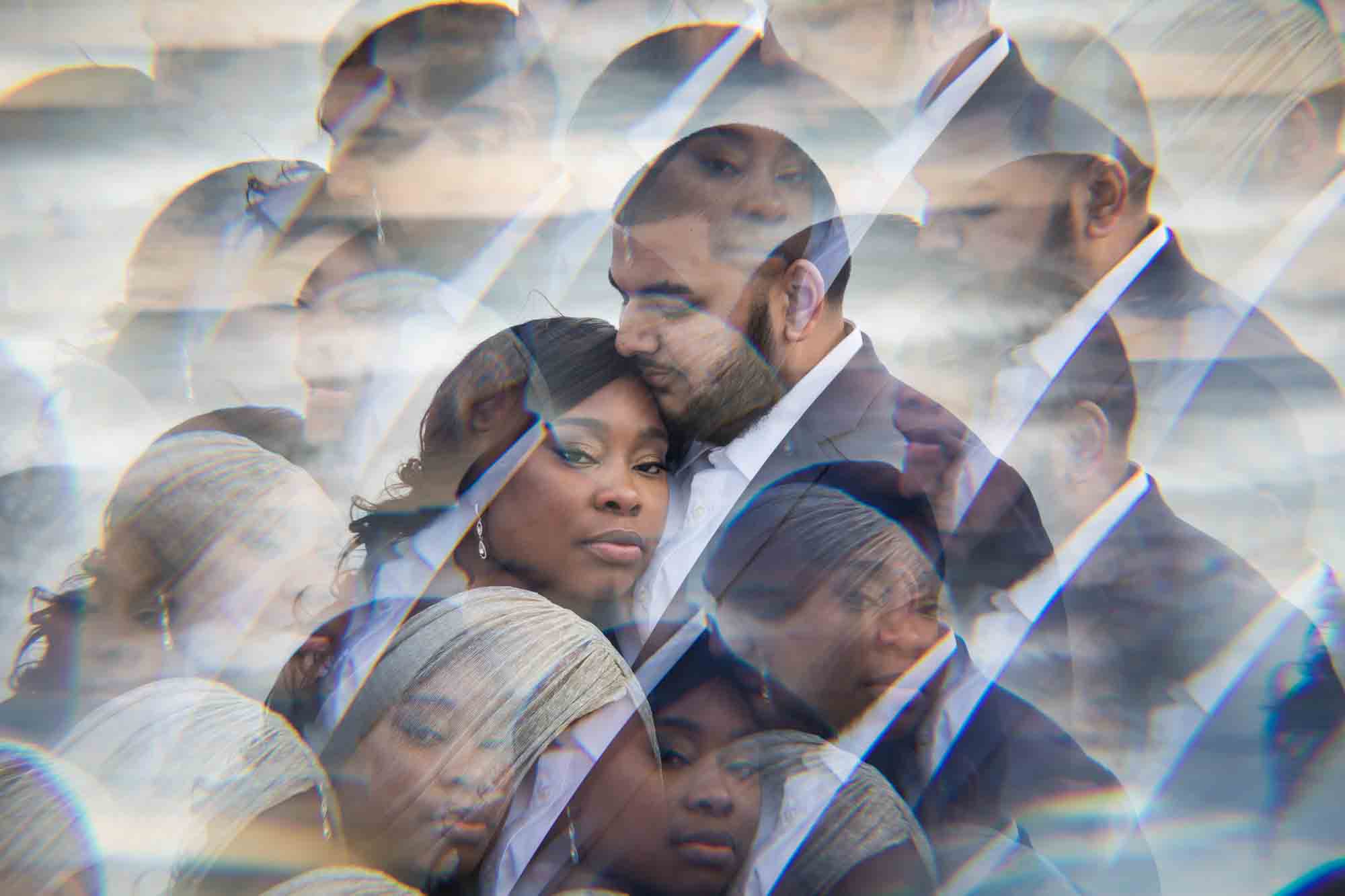 Couple hugging as viewed through a prism