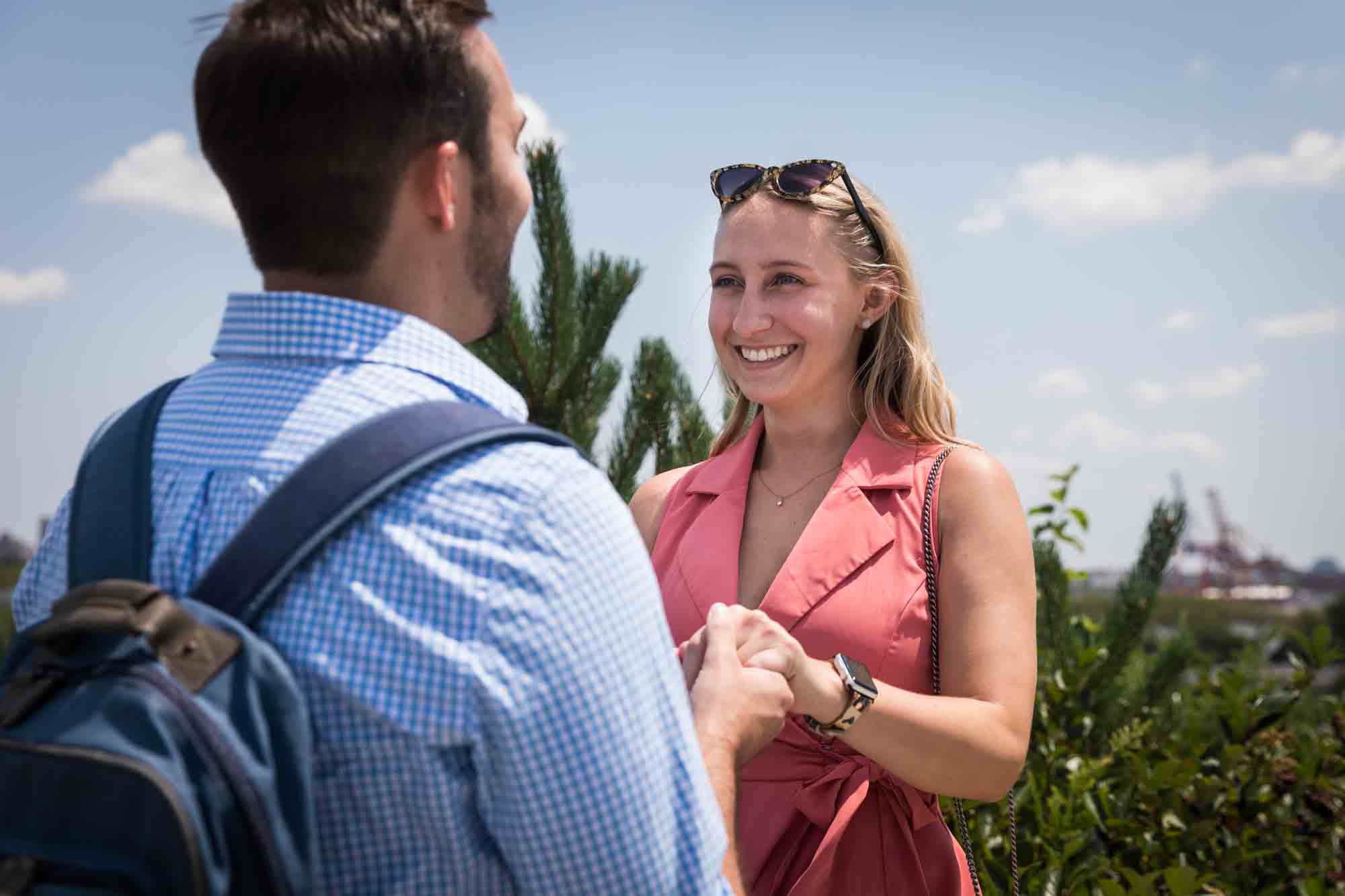 Man proposing to woman for an article on how to propose on Governors Island