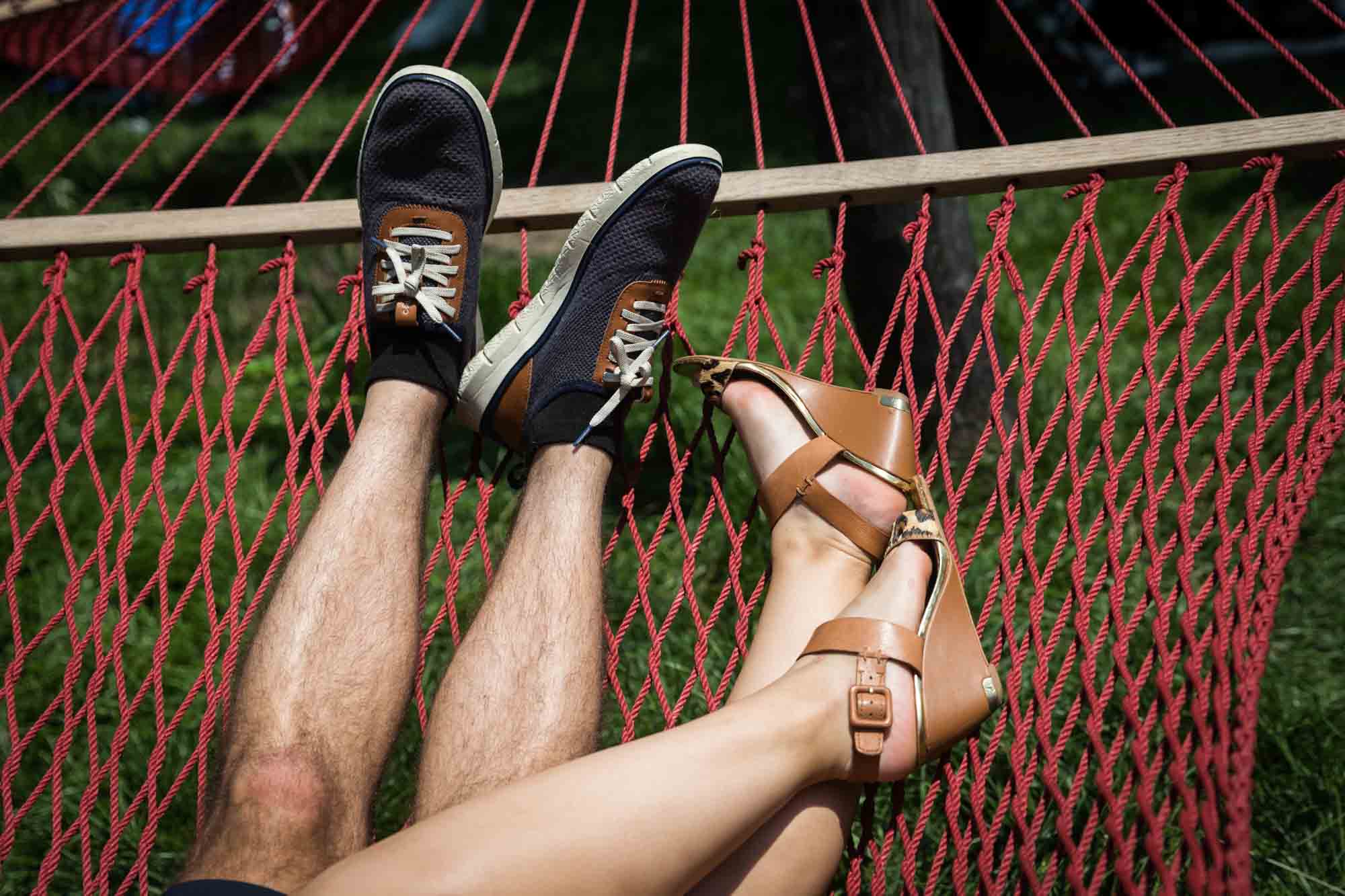 A couple's feet on a hammock on Governors Island