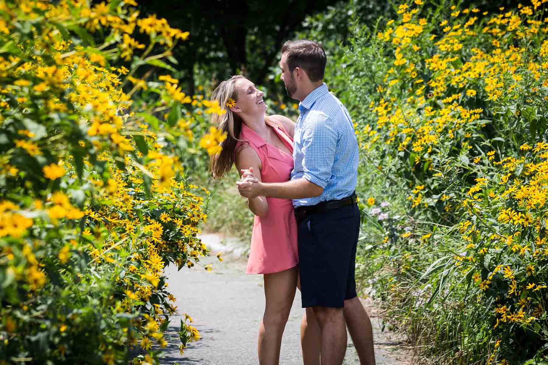 Couple dancing in Hammock Grove for an article on how to propose on Governors Island