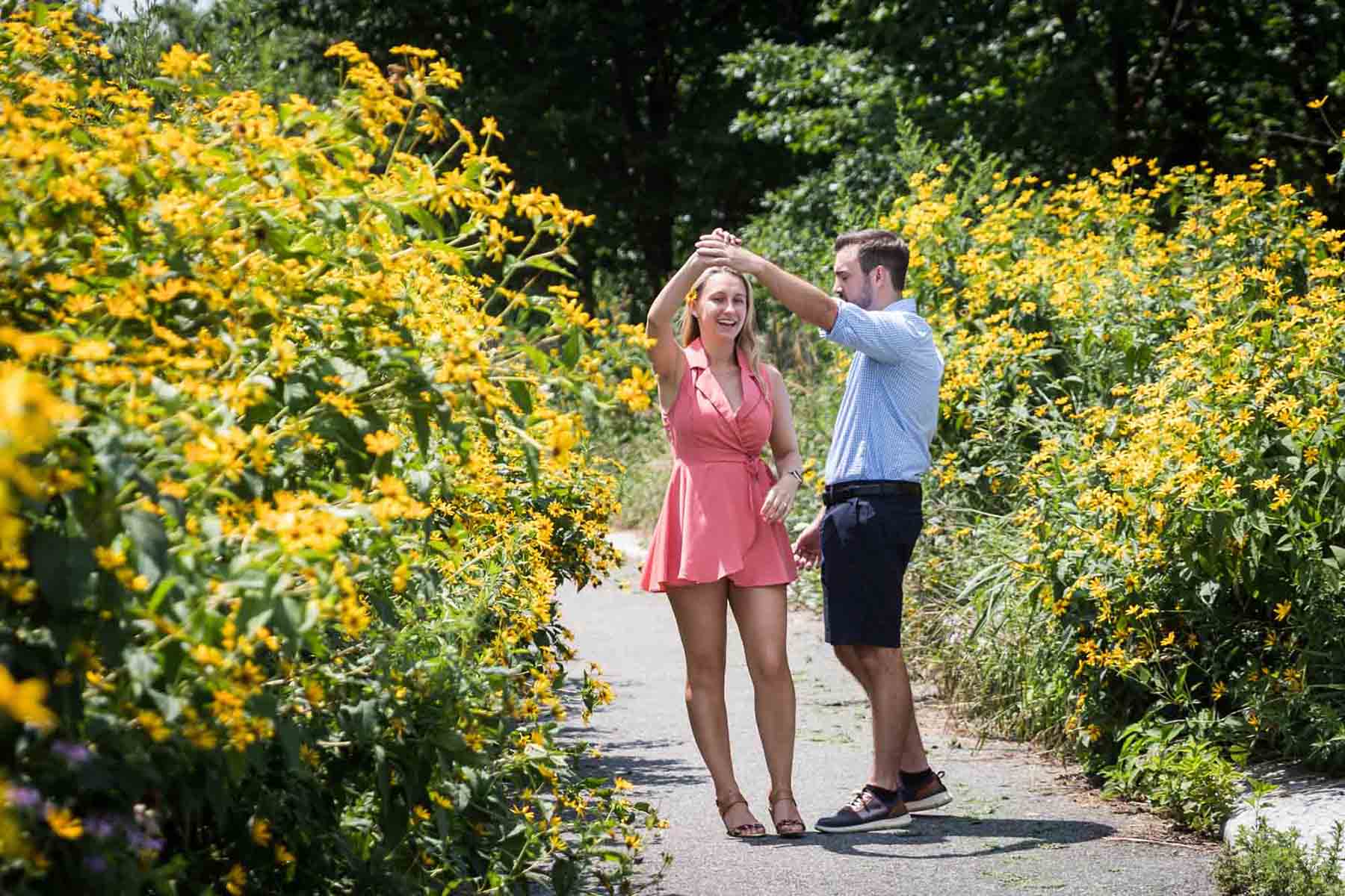 Couple dancing in Hammock Grove for an article on how to propose on Governors Island