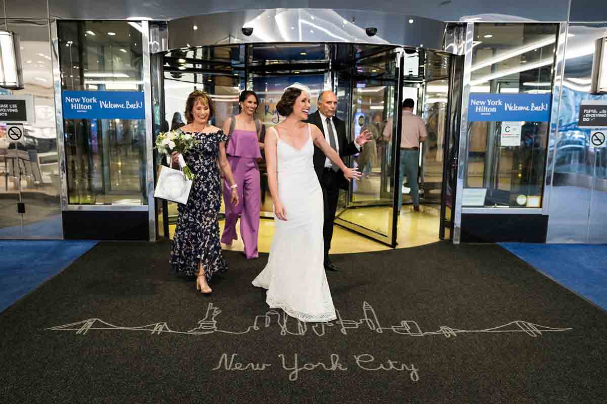 Bride and guests leaving New York Hilton Midtown Hotel