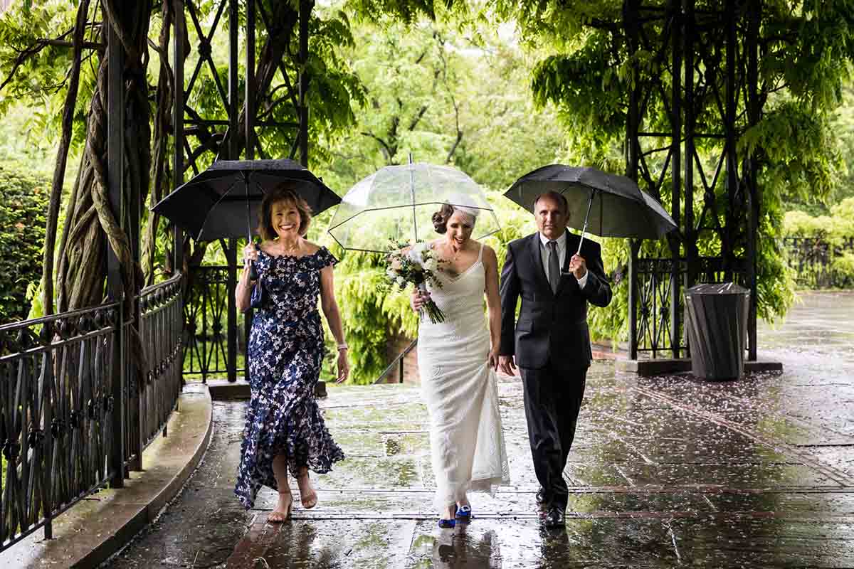 Central Park Wisteria Pergola wedding photos of bride and parents approaching the groom