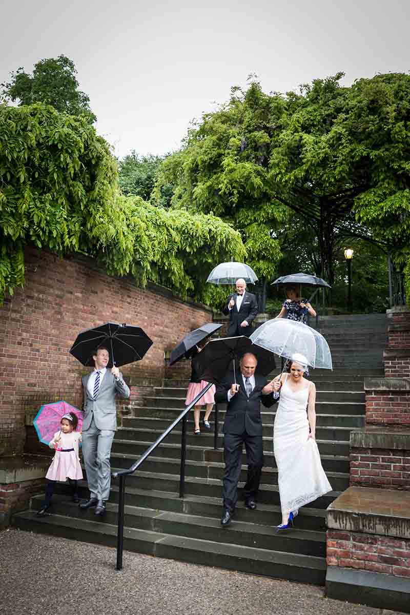 Central Park Wisteria Pergola wedding photos of guests and bride walking down staircase