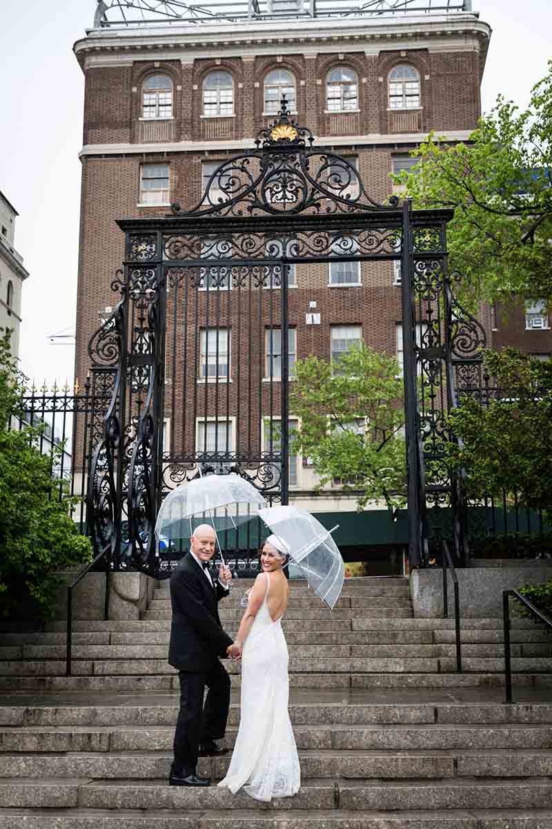 Central Park Wisteria Pergola wedding photos of bride and groom in front of Conservatory Garden Vanderbilt Gate