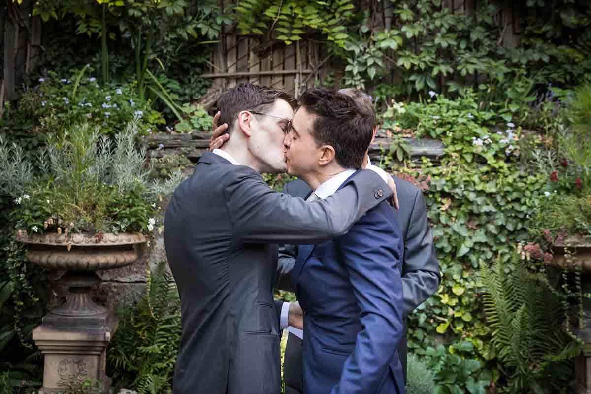 Merchant’s House Museum NYC wedding photos of two grooms kissing