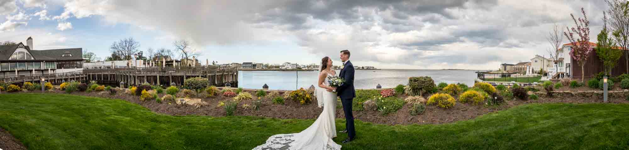 Panoramic photo of bride and groom at the Riviera Waterfront Mansion