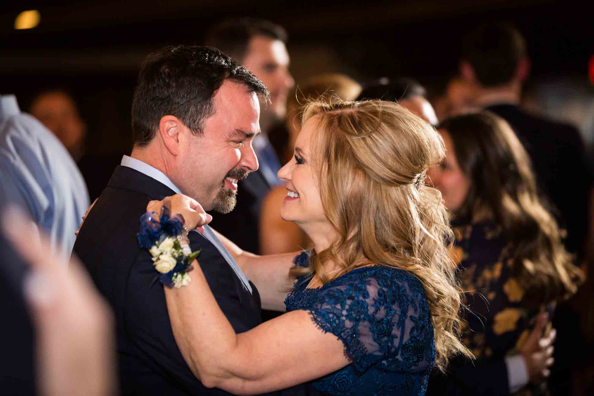 Couple dancing at Riviera Waterfront Mansion wedding