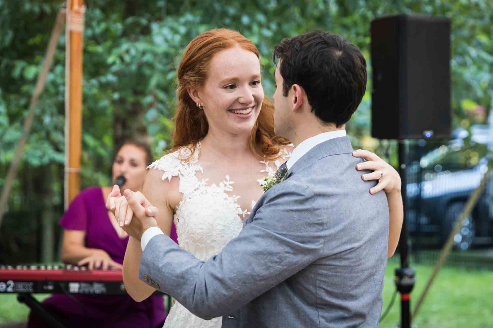 Bride and groom dancing for an article on backyard wedding tips