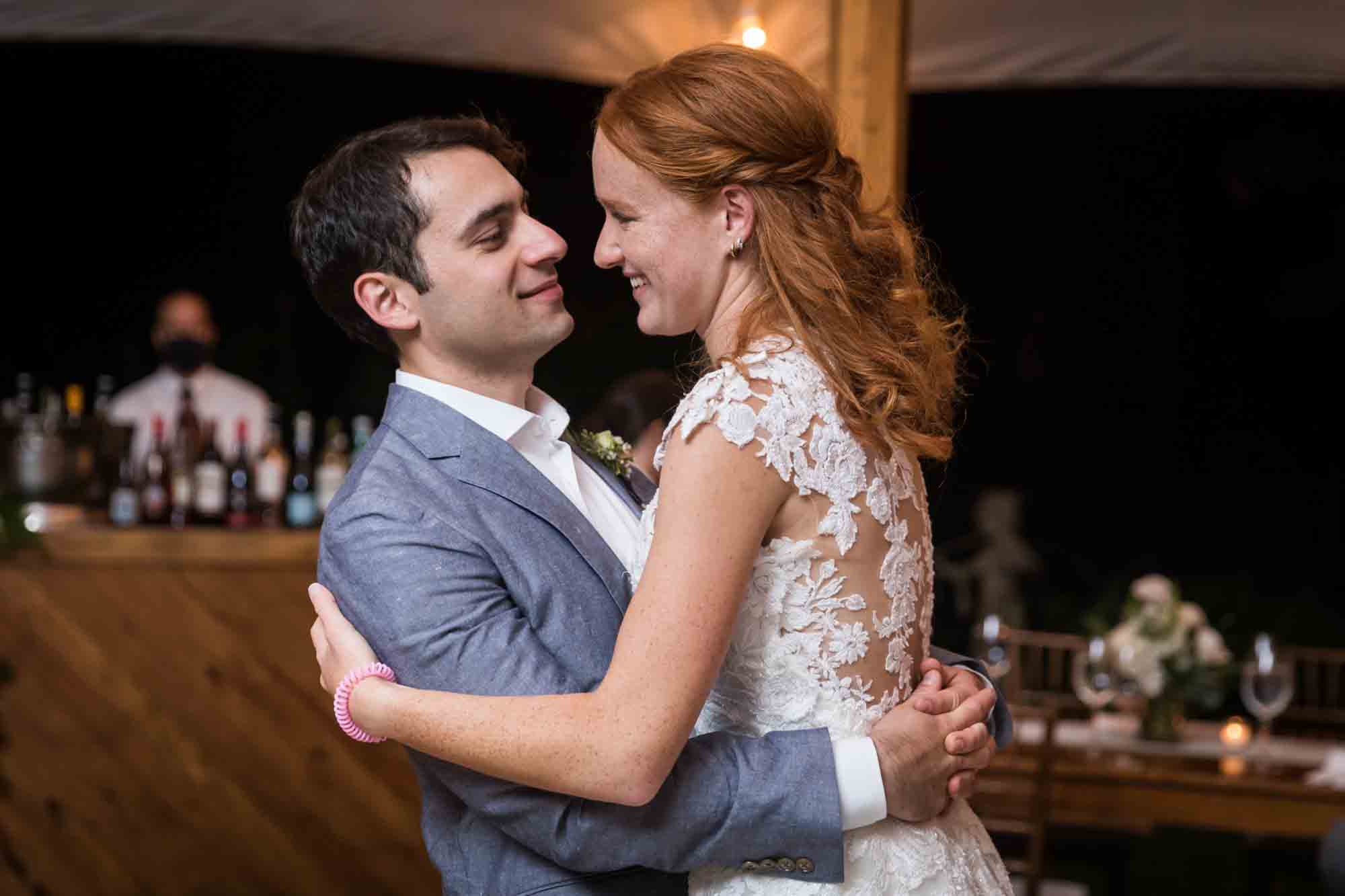 Bride and groom dancing for an article on backyard wedding tips