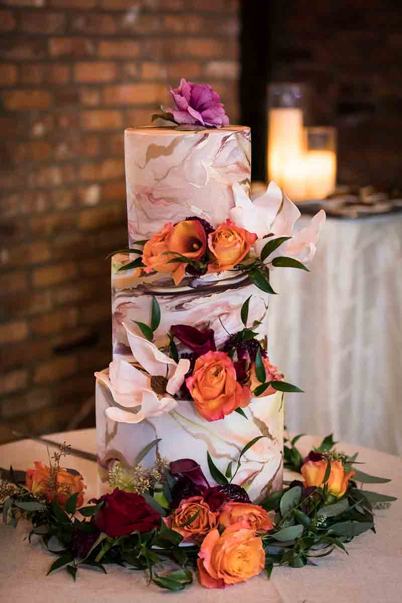 Wedding cake with flowers at a Deity wedding